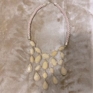 Eye catching, one of a kind neckline beauty.